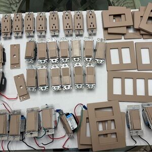 Lutron Diva dimmers, switches, plugs, gang plates and accessories. Used.